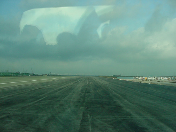 02546- Gibraltar Airport runway through the bus window
